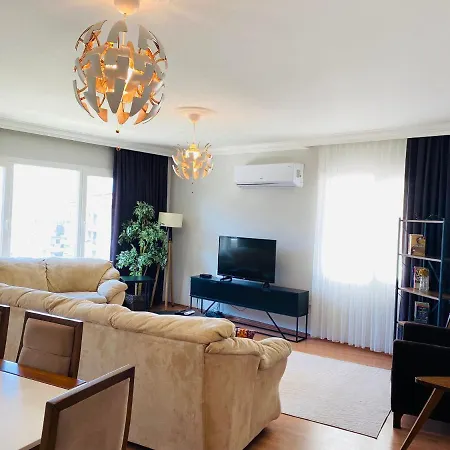 Apartament Merkezde 3+1 Deniz Manzarali Konsept Kusadası